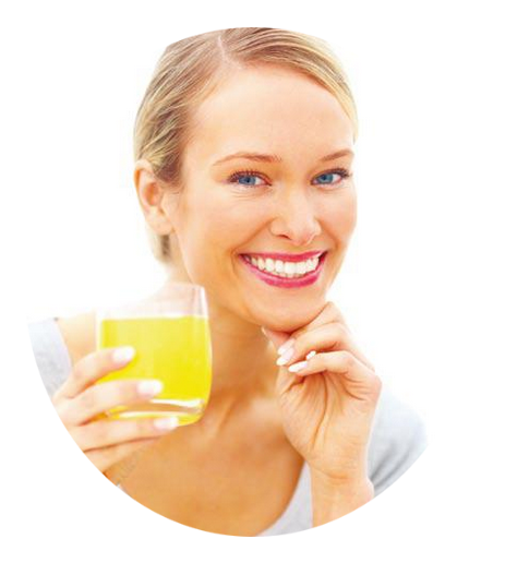 Smiling woman with glass of Liquid C + Bioflavonoids with Rose Hips
